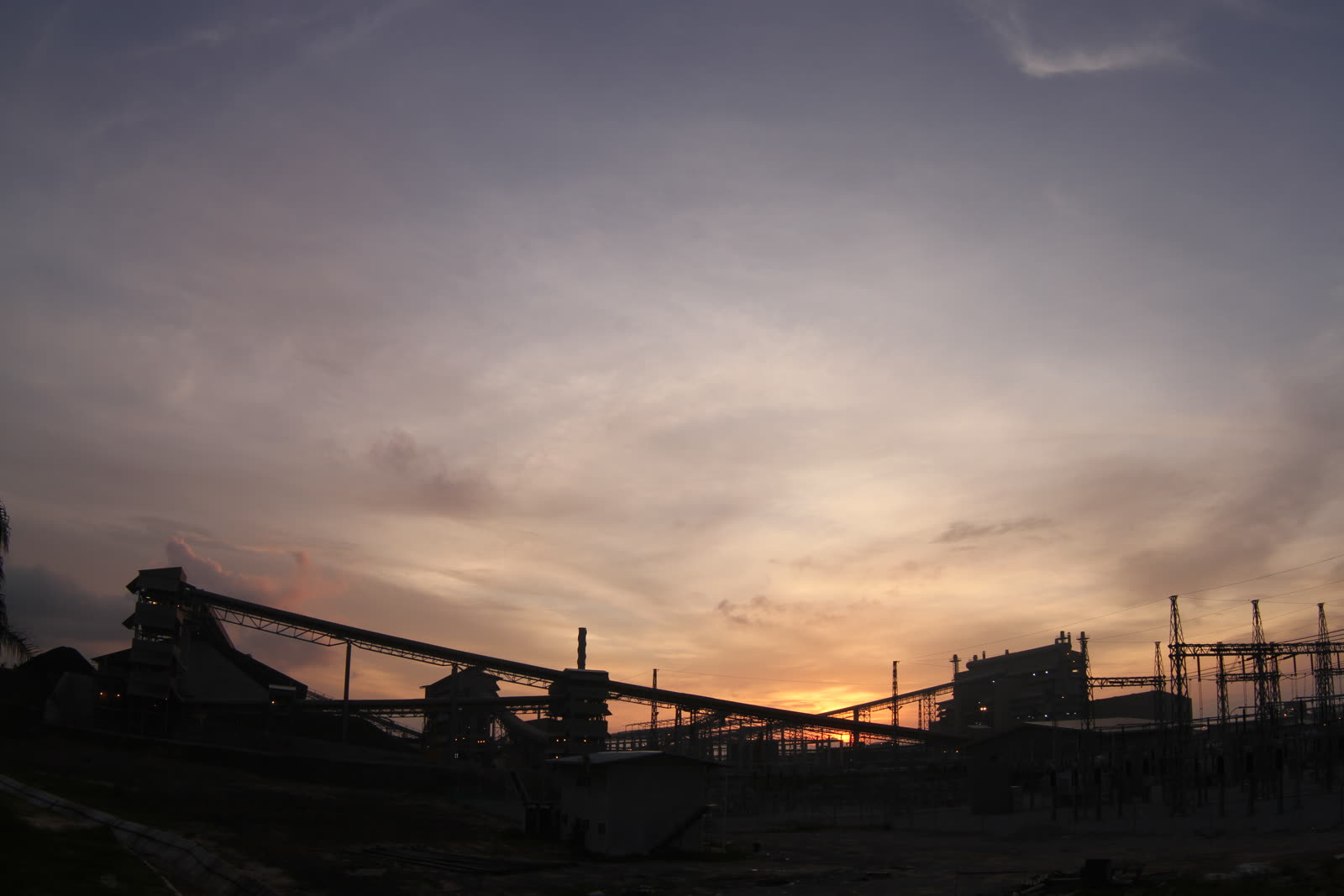 The Sakura Ferroalloys manganese smelting plant at sunset in Samalaju, Sarawak