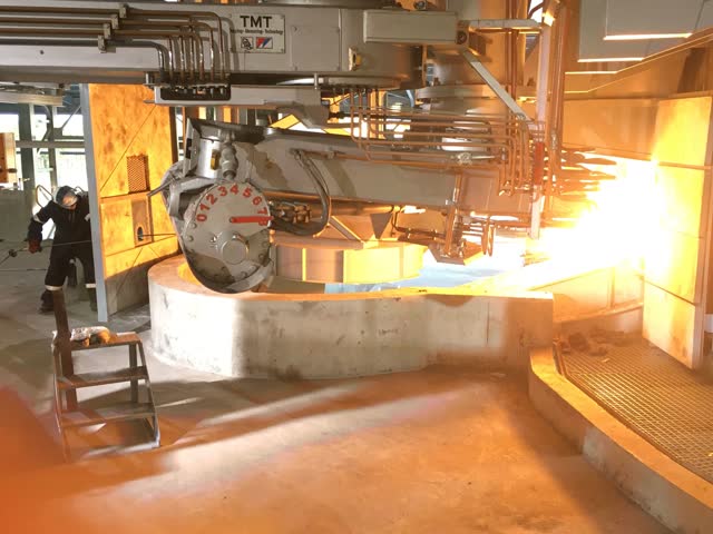 Tapping molten alloy from a submerged-arc furnace at Sakura Ferroalloys